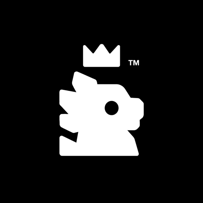 A white Kaiju Kingz logo featuring a crowned creature head on a black background, with the "TM" trademark symbol displayed next to the crown. The image represents the Kaiju Kingz NFT project being referenced in the post about its potential return to Robinhood trading following Saudi oil market activity.