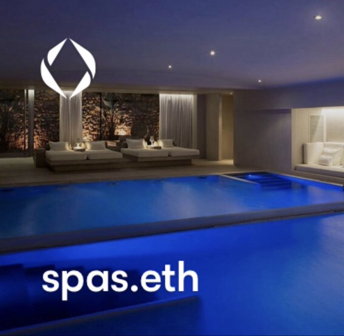 An image of a luxurious indoor swimming pool area with modern lounge seating, featuring an Ethereum logo in the upper left and the text 'spas.eth' at the bottom.