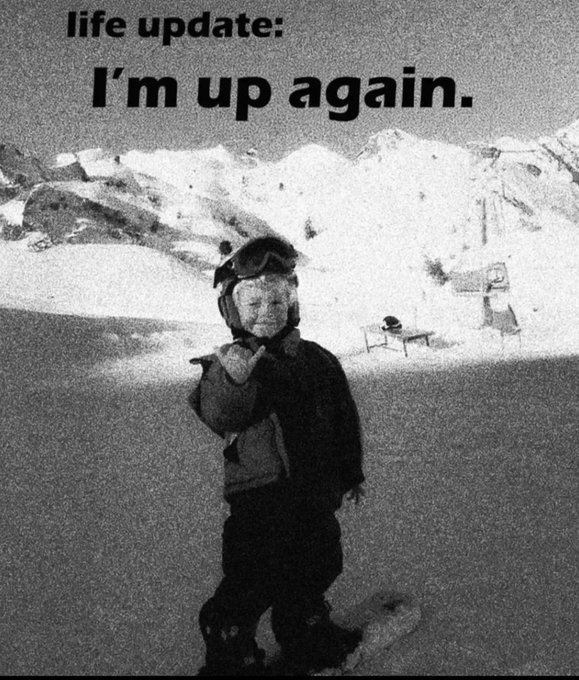 A black-and-white meme image of a young child in ski gear pointing forward includes the text 'life update: I'm up again.'