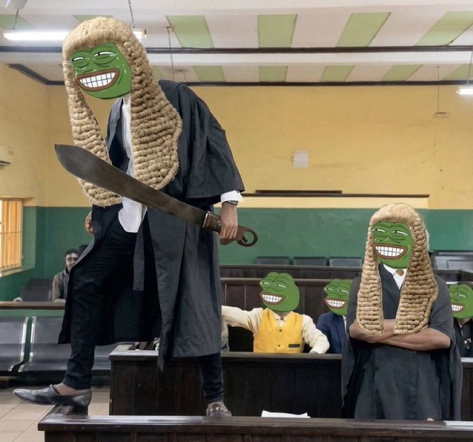 The image shows a courtroom scene featuring people in black lawyer robes and traditional judicial wigs, with their faces obscured by Pepe the Frog meme stickers, humorously edited to appear as though lawyers and judges are animatedly cheering.

One figure prominently stands on a desk holding a large machete-like blade while wearing a green Pepe-faced wig, while another stands with arms crossed and others sit laughing in the background, all with exaggerated grinning Pepe expressions—fitting the post's playful "where are those messi fans" caption about passionate football supporters.