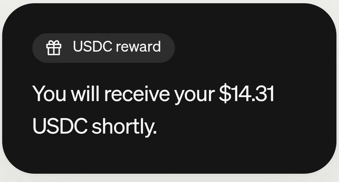 A notification from Coinbase reads "USDC reward" with the message "You will receive your $14.31 USDC shortly."