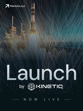 The image shows a poster with the words "Launch" written at the top and the phrase "by KinetIQ now live" below. The background of the poster features illustrations of rockets and buildings, suggesting that this may be an advertisement for a product or service related to space exploration or rocketry. The main focus of the poster is on the launch event being advertised by KinetIQ.