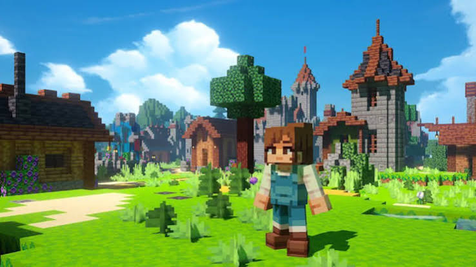 A voxel-style 3D rendering shows a Minecraft-like character with brown hair standing in a grassy field with blocky houses and towers in the background under a blue sky.
