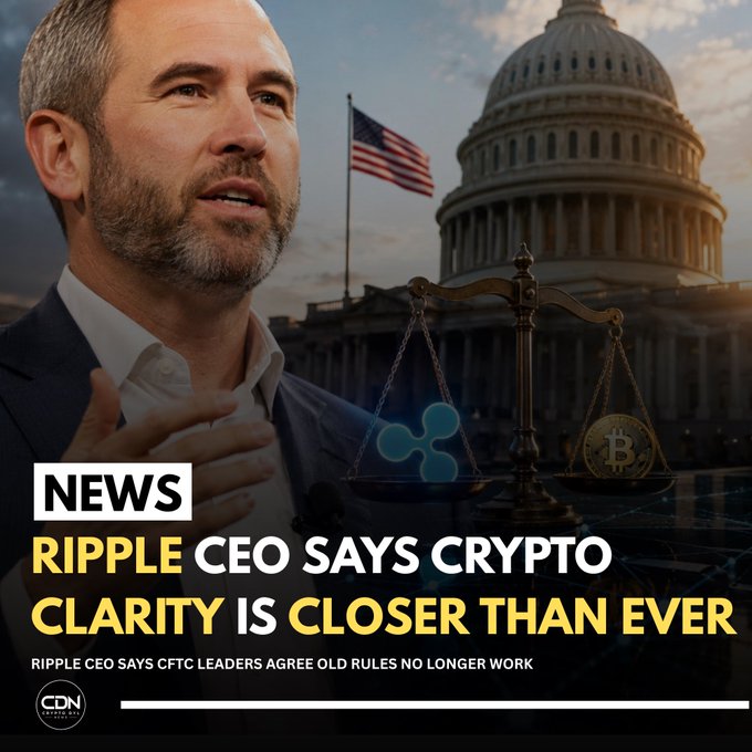 A news graphic from CDN featuring Ripple CEO Brad Garlinghouse with text reading 'NEWS: RIPPLE CEO SAYS CRYPTO CLARITY IS CLOSER THAN EVER' alongside the U.S. Capitol and a scale balancing Ripple and Bitcoin logos.