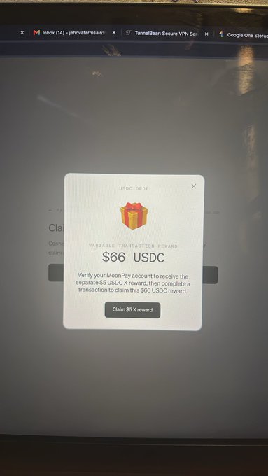 A laptop screen displays a MoonPay USDC Drop pop-up offering a "$66 USDC" variable transaction reward, verifying the user's MoonPay account to complete an X reward. This visual supports the post's celebratory message about being in Nigeria and earning $66 in crypto rewards from MoonPay, humorously referenced as "audio money."