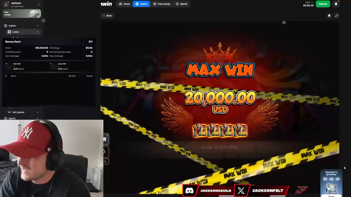 A streamer wearing a red NY Yankees cap celebrates a "MAX WIN 20,000.00 USD" screen on the 1win casino platform during a "Bonus Hunt" session, with the chat overlay displaying his handles "JACKSONSGUILD" and "JACKSONFELT" along with the promo code "jacksonfelt" referenced in his claim of back-to-back max wins on the Snoop Dog Dollars slot.