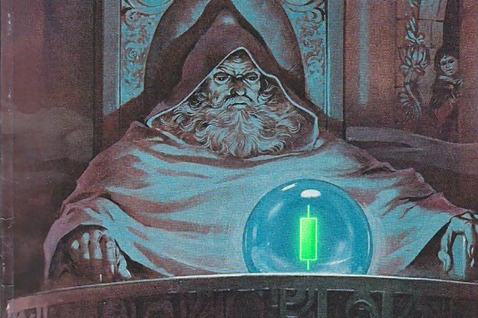 A fantasy illustration of a hooded wizard with a long white beard sitting behind a glowing green crystal orb on a pedestal.