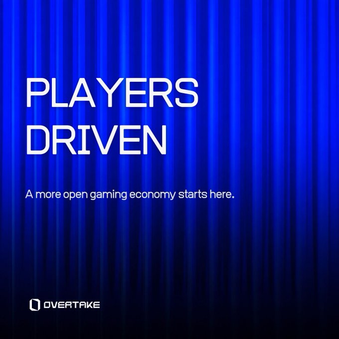 A blue promotional banner with vertical light streaks featuring the text 'PLAYERS DRIVEN' and 'A more open gaming economy starts here,' with the 'OVERTAKE' logo at the bottom.