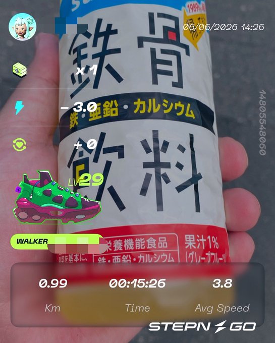 The image shows a person's hand holding an item, possibly a can of soda or energy drink, with a fitness tracking app displayed on their phone screen. The app provides information about the user's activity level, including steps taken, calories burned, and distance traveled during a walk.