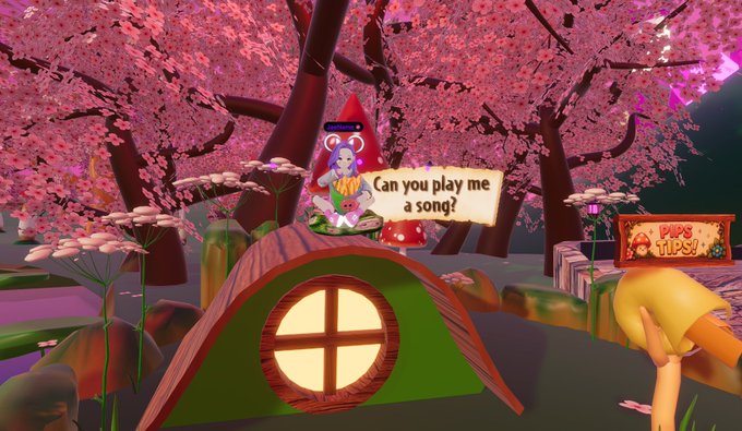 A screenshot from Decentraland's "Shroom Zoom" virtual world shows a cute mushroom-house character in a magical cherry blossom forest, with a speech bubble asking "Can you play me a song?" and a "PIPS TIPS!" sign visible nearby, capturing the whimsical and interactive vibe the post celebrates.