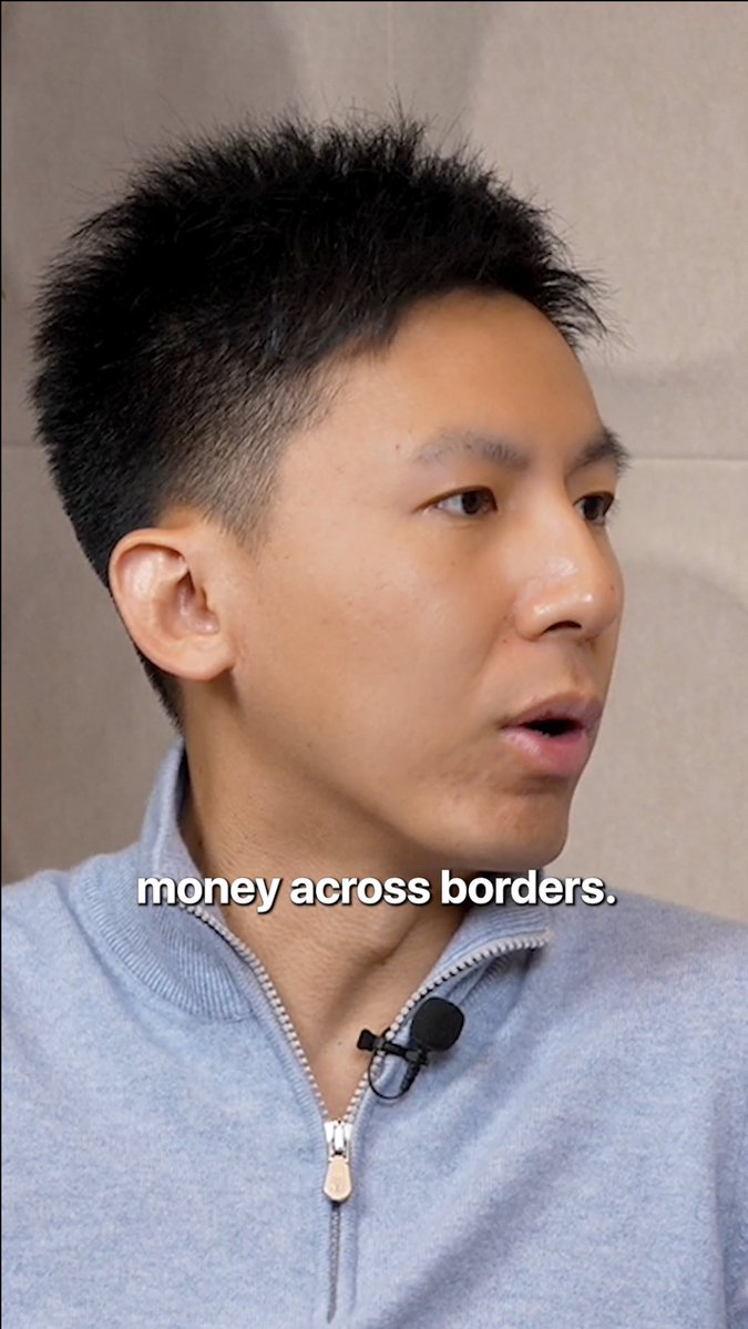 A man wearing a light gray zip-up sweater with a lapel microphone speaks while captioned text reads "money across borders." The image appears to be from a discussion between David Gan of Inception Capital and Aptos's aptAlix about Aptos's role in solving cross-border money movement challenges in emerging markets.