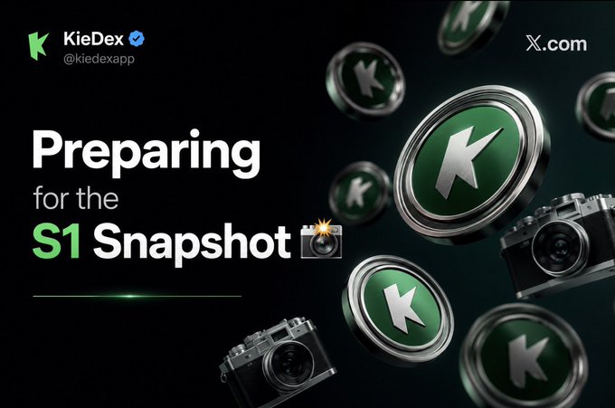A promotional graphic by KieDex (@kiedexapp) featuring green "K" branded tokens and camera icons alongside the text "Preparing for the S1 Snapshot," visually supporting the announcement that Season 1 Snapshot preparation is officially underway.