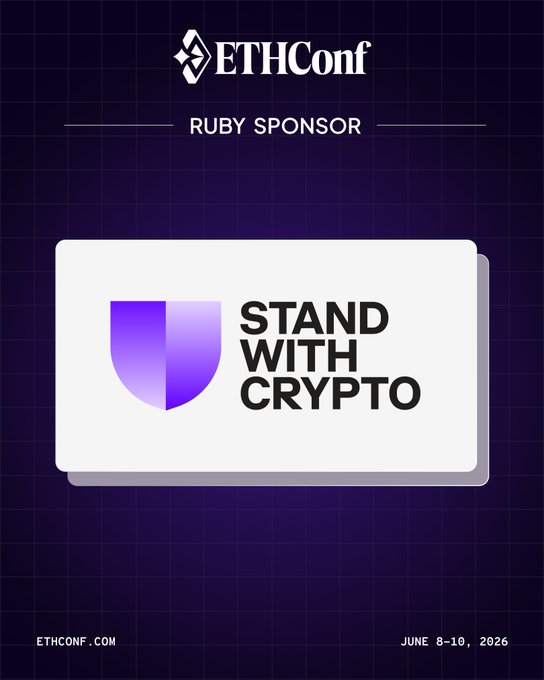 The image features an advertisement for the EthCon conference that took place in New York City from June 8-10, 2016. The poster displays a purple shield with the words "Stand With Crypto" written below it. There are also two smaller images of the Ethereum logo and a text box containing the event's date and location.