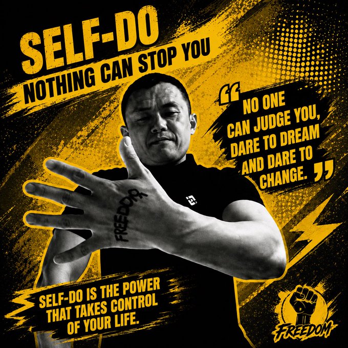 The image is a motivational graphic featuring a man in a "Freedom" shirt with his hand raised, displaying "FREEDOM" written on his palm. Bold yellow and black text reads "SELF-DO: NOTHING CAN STOP YOU," along with quotes like "No one can judge you, dare to dream and dare to change" and "Self-do is the power that takes control of your life," with a "FREEDOM" logo featuring a raised fist in the corner.

The post references @cz_binance (Changpeng Zhao, founder of Binance), and the image's themes of "FREEDOM," "SELF-DO," and taking control of your life align with the suggestion to "drop your BNB wallet," reinforcing a crypto-liberty and self-empowerment message tied to the Binance community.