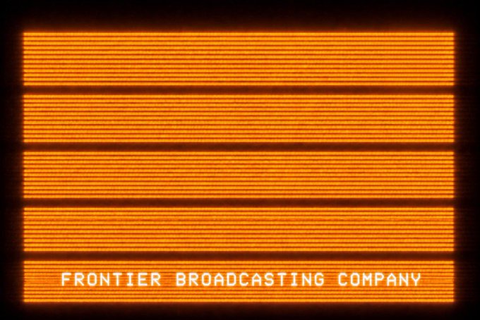 A retro-style orange and black test pattern screen with horizontal lines and the text 'FRONTIER BROADCASTING COMPANY' displayed at the bottom.