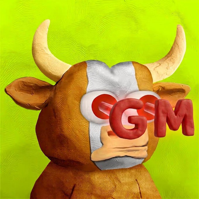 A claymation-style bull character with large horns stares forward with bulging red eyes that spell out "GM" in bold red letters. The image humorously plays on the popular "say gm" crypto/web3 greeting, with the bull literally responding "GM" (good morning) back at the viewer.