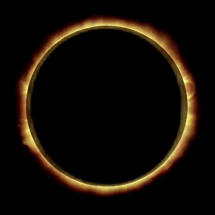 A solar eclipse captured in its annular phase, with the moon silhouetted against the sun leaving a brilliant ring of fire glowing against the black sky.