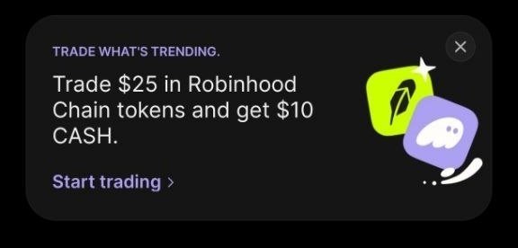 A Robinhood promotional popup advertisement reading 'TRADE WHAT'S TRENDING. Trade $25 in Robinhood Chain tokens and get $10 CASH.' with a Start trading link.