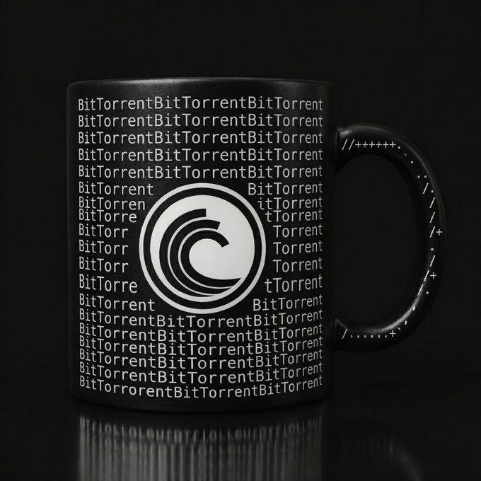A black mug featuring the BitTorrent logo repeated across its surface, with binary-like symbols (/+++++++, /....) printed on the handle, set against a black background.