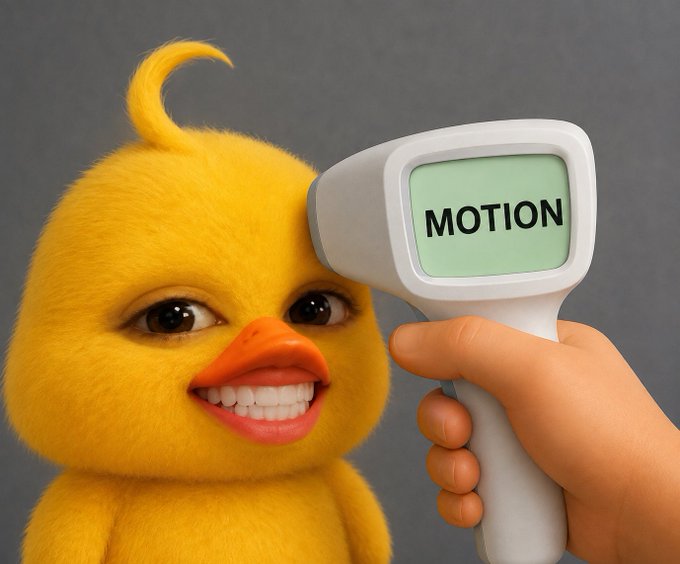 A 3D-rendered yellow duck character with human-like features smiling while a cartoon hand points a thermometer-shaped device at its head displaying the word 'MOTION' on the screen.