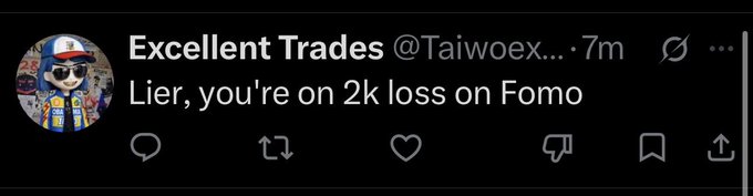 A tweet from 'Excellent Trades' (@Taiwooex...) reading 'Lier, you're on 2k loss on Fomo' posted 7 minutes ago, featuring a profile picture of a Lego character wearing sunglasses.