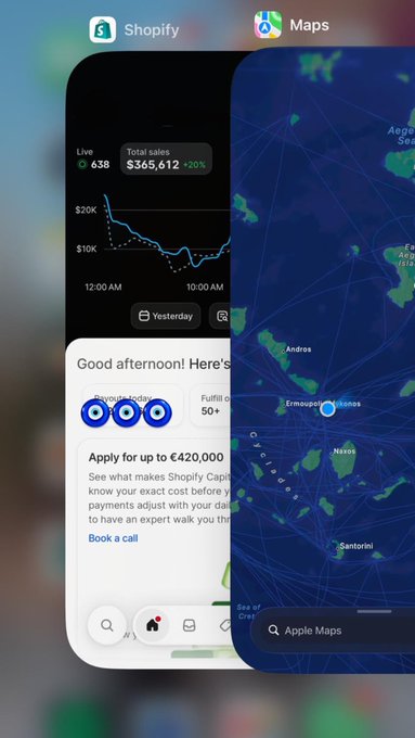 The image shows two iPhone app screenshots: a Shopify dashboard displaying live sales of $365,612 with a 20% increase compared to yesterday, and Apple Maps showing the Greek islands including Mykonos, Santorini, Naxos, and Andros. The Shopify earnings clearly align with the post's claim of a "$360K day" funding the Mykonos expenses shown in the map.