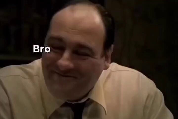 The image features a man wearing a yellow shirt, sitting down with his head tilted slightly to the left side of the frame. The caption below the image reads "That one bro that says he'll buy Bitcoin when it goes back to 15K". This suggests that the man is talking about Bitcoin and its potential value in the future.