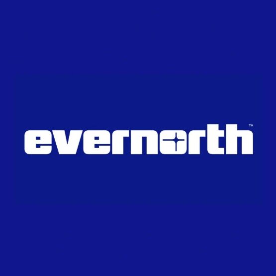 The image displays the white "evernorth" logo with a trademark symbol on a solid blue background. This branding relates to the post by showcasing Evernorth's corporate identity as the company prepares for its Times Square premiere featuring its XRP Ledger campaign.