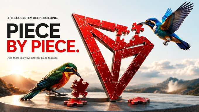 A promotional image with the text 'THE ECOSYSTEM KEEPS BUILDING. PIECE BY PIECE. And there is always another piece to place.' shows a red geometric structure made of puzzle pieces with two colorful birds, one holding a puzzle piece in its beak.
