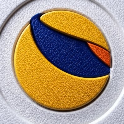 The image features a logo with a yellow circle, which has been cut into two distinct sections - one yellow part and one blue part. The yellow section appears to be a sun, while the blue section resembles an orange or red object. The background of the image is white, providing contrast for the logo's colors. There are no texts present in the image.