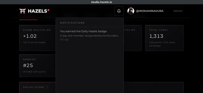 A screenshot of a 'studio.hazels.io' dashboard for user '@INOKAMIKAGURA', showing a notification for an 'Early Hazels' badge and stats including a score multiplier of x1.02 and a total YORO! score of 1,313.