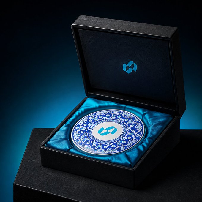 A black presentation box with satin lining displays an ornate blue-and-white porcelain plate featuring intricate floral patterns and a stylized "B" logo, accompanied by the tagline "TRADE THE FUTURE." The luxurious packaging visually echoes the post's theme of blending traditional craftsmanship with modern finance, presented in BitradeX's signature blue.