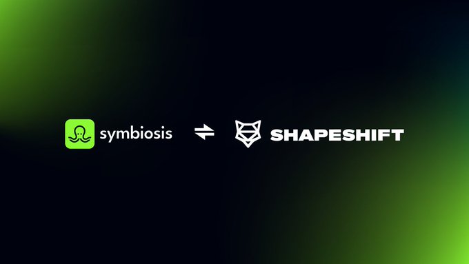 A brand transition graphic displays the Symbiosis logo and name, an equals sign, and the SHAPESHIFT logo on a dark green-black gradient background.
