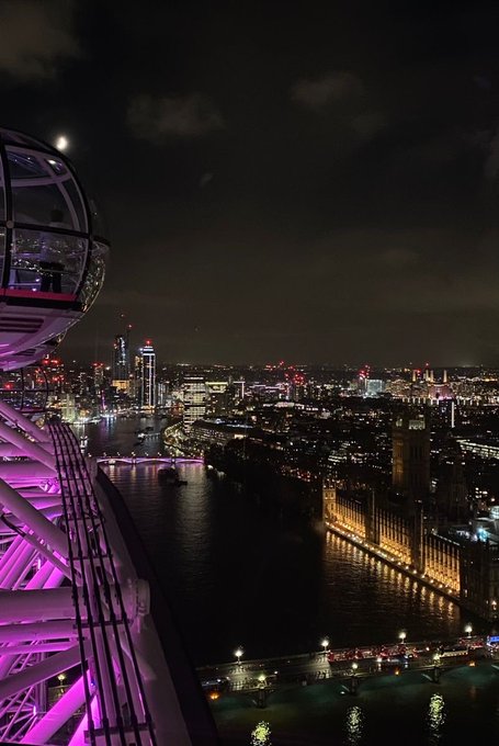 A nighttime view from the London Eye shows the illuminated River Thames winding past the Houses of Parliament and the city skyline, with a glowing capsule visible on the left. The post "gn ct. don't pump without me." suggests the image is shared as a goodnight message from the city, pairing a scenic farewell with the casual sign-off.