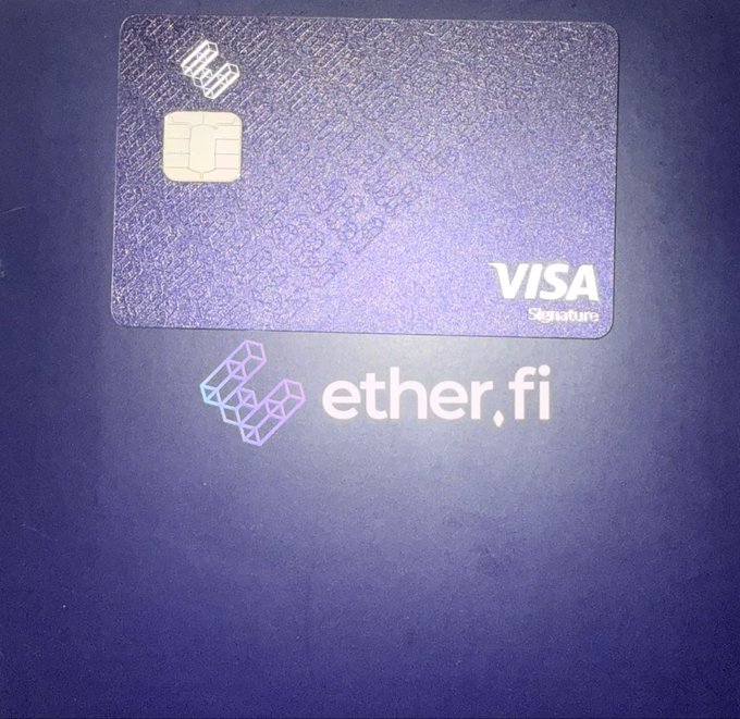 A purple, textured Visa Signature debit card featuring an EMV chip, displayed above the ether.fi logo on a dark background.