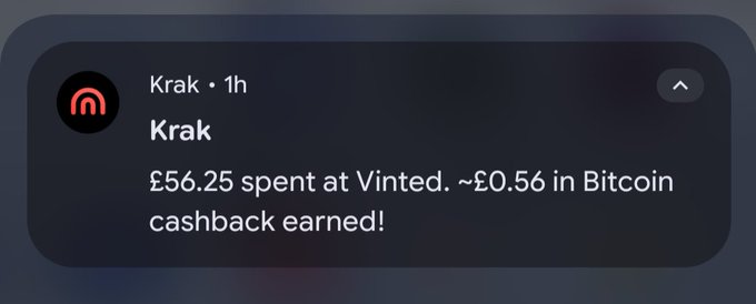 A push notification from "Krak" shows that £56.25 spent at Vinted earned ~£0.56 in Bitcoin cashback, illustrating the "That’s what cash₿ack looks like" message by showing how everyday spending can be converted into small Bitcoin rewards.