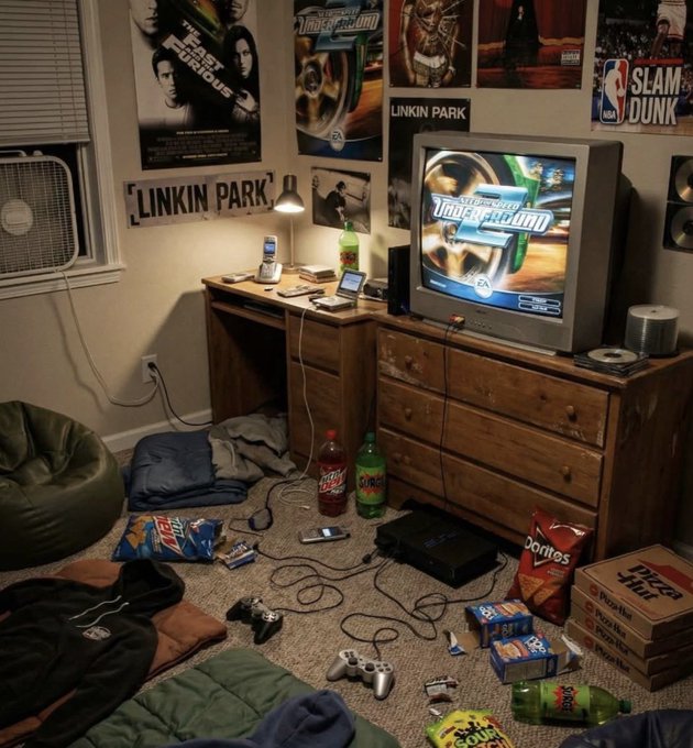 A messy bedroom features a TV displaying a game, Linkin Park posters, scattered Doritos and Sour Patch Kids snacks, a DualShock controller on the floor, and multiple Surge soda bottles — capturing the post's mention of unwinding with Surge after reuniting with friends.