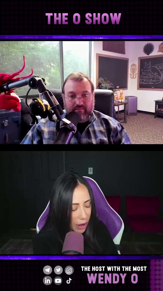 The image shows a man and woman sitting behind microphones during an interview with a host named Wendy O. The hosts are discussing the topic of governments regulating crypto, as well as the dangers posed by artificially intelligent chatbots like ChatGPT. The hosts seem to be sharing their opinions on this matter, possibly highlighting the risks associated with AI and its impact on society.