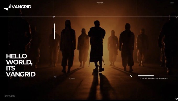 A stylized, moody image showing silhouettes of several hooded figures standing against a dark, orange-lit background with the text 'HELLO WORLD, ITS VANGRID' and 'VANGRID' branding.