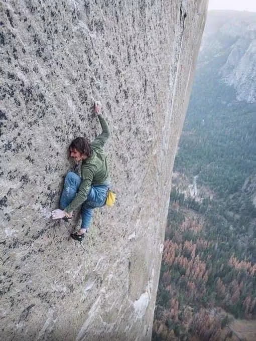 The image shows a man climbing up a tall rock face with his hands outstretched for balance. The photo has been edited to include a caption that reads "Don't go into crypto, it's risky", which seems unrelated to the main subject of the image. This could be an attempt to draw attention to the dangers associated with cryptocurrency or to make a statement about the risks involved in climbing such a tall rock face.

The photo is titled "Me: Climbing up a mountain" and has been edited to include a caption that reads "Don't go into crypto, it's risky". The caption seems to be an attempt to emphasize the risks associated with cryptocurrency or to make a statement about the dangers of climbing such a tall rock face.