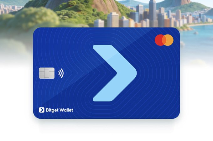 A blue Bitget Wallet Mastercard is displayed against a scenic backdrop of Rio de Janeiro, featuring the brand's chevron logo and "Bitget Wallet" text. The post highlights the card's appeal by contrasting typical crypto card rewards (low fees, cashback, forgettable points) with what appears to be a more distinctive offering of up to 3% cashback.