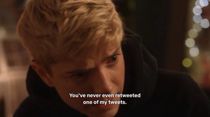 A young man with blond hair wearing a black hoodie looks downward with a disappointed expression, with subtitles reading "You've never even retweeted one of my tweets." The image humorously illustrates the frustration of content creators who give their all to their audience but rarely receive simple engagement like retweets or live stream support in return.