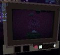 A very small, blurry image appears to show a dark CRT television or monitor displaying a purple screen with some indistinct imagery.