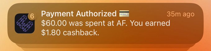 A phone notification showing a payment authorized 35 minutes ago, with $60.00 spent at AF and $1.80 cashback earned, alongside an app icon with the number 6.