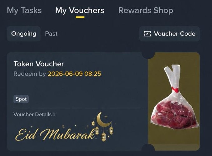 The image features a screenshot of an item, which appears to be some meat, presented in a bag with a red bow. The bag also has a label attached that reads " Eid Mubarak". This context implies that this could possibly be a gift or a donation related to the holiday season or Eid celebrations.