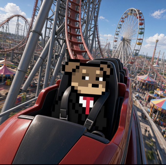 A pixelated character in a black suit with a red tie rides a red roller coaster at an amusement park with a Ferris wheel and circus tents in the background.