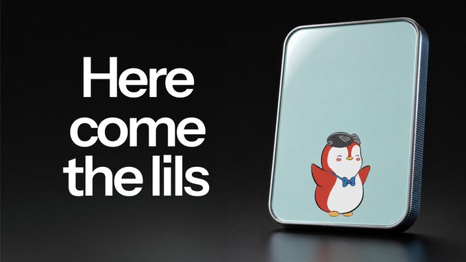 Here come the Lils. The cellphone is decorated with a stylized cartoon bird penguin with its wings spread open wearing a purple bowtie and sunglasses. The advertisement encourages anticipation for the debut of more collections, next Lil Pudgys.