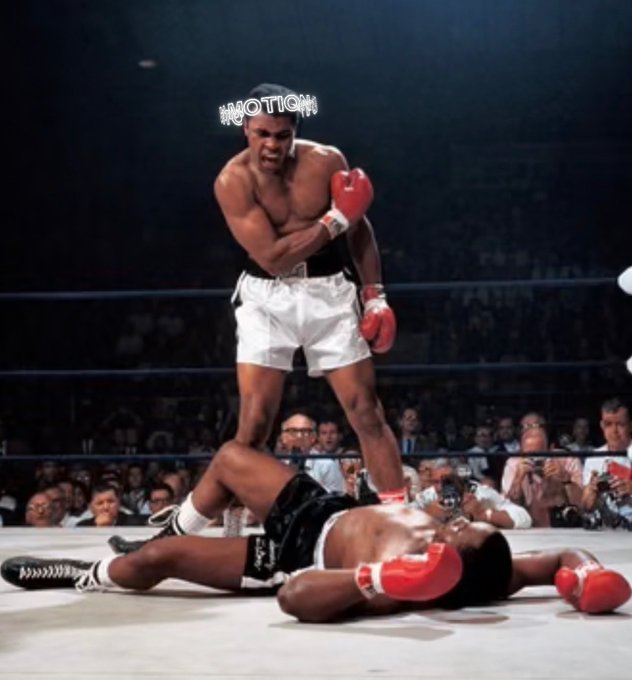 A historic boxing match photo showing Muhammad Ali standing over a fallen Sonny Liston, with the text '#NOTIGLOO' overlaid at the top.