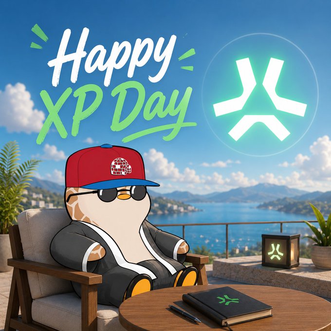 A promotional graphic celebrating 'Happy XP Day' featuring a stylized character wearing sunglasses and a red cap relaxing on a chair with a scenic coastal view, alongside the XP Network logo.