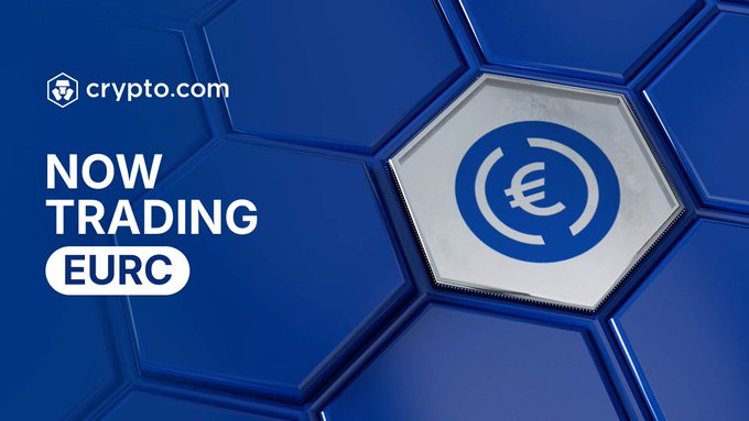 A promotional graphic from Crypto.com announcing that the Euro Coin ($EURC) is now trading on the Crypto.com App, featuring a hexagonal design with the EURC logo in a silver tile against a blue honeycomb background alongside the text "NOW TRADING EURC" and the Crypto.com branding.